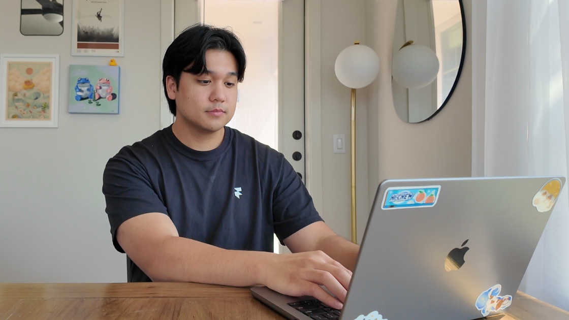 Chris working on laptop